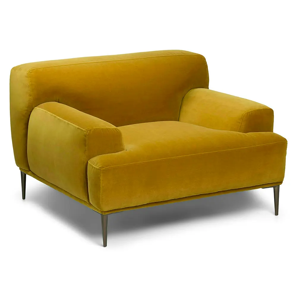 Yellow sofa with metal legs in lounge.