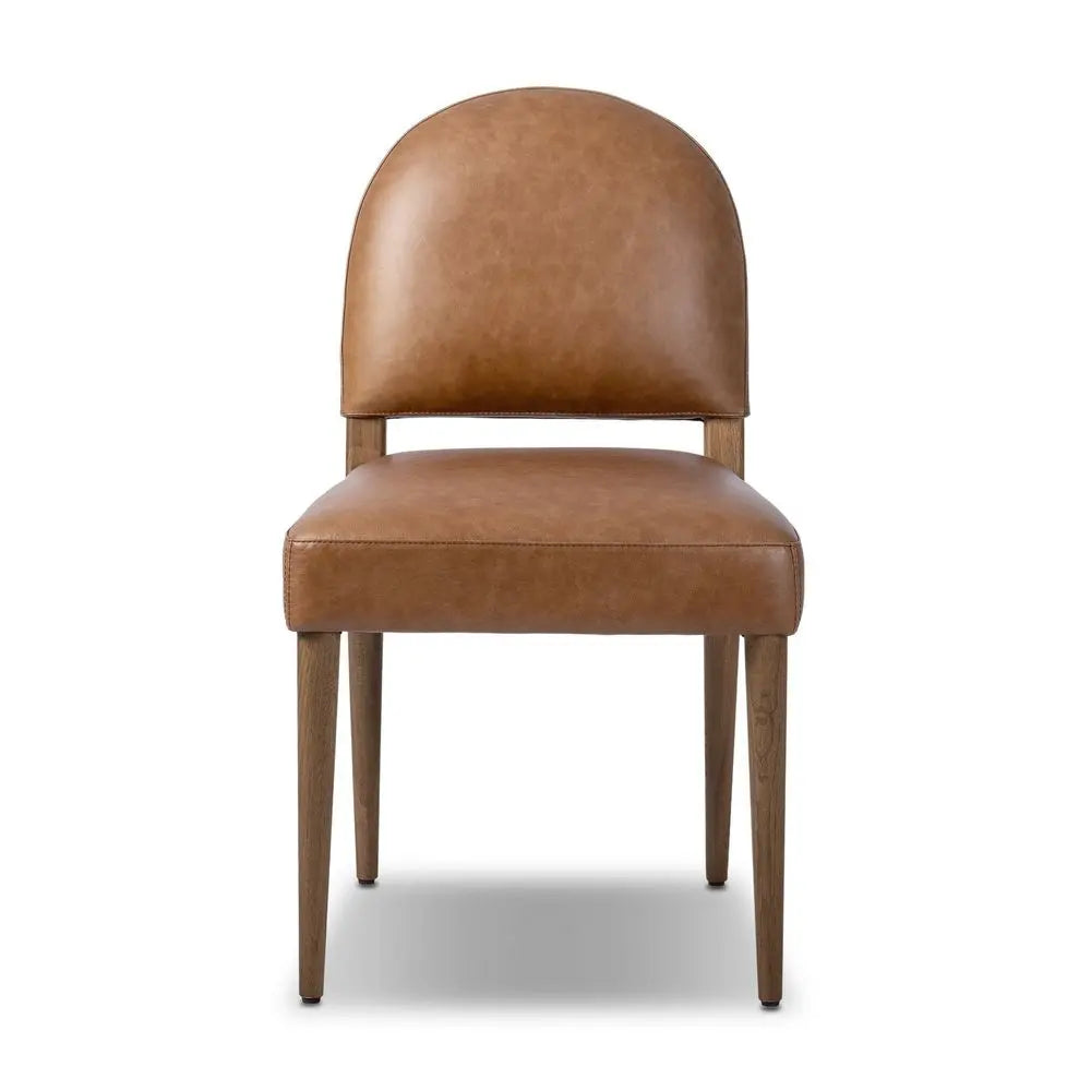 Brown leather chair with soft texture in lounge.