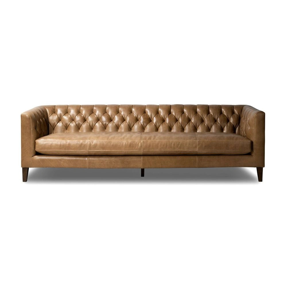 Stylish brown leather sofa on a white background