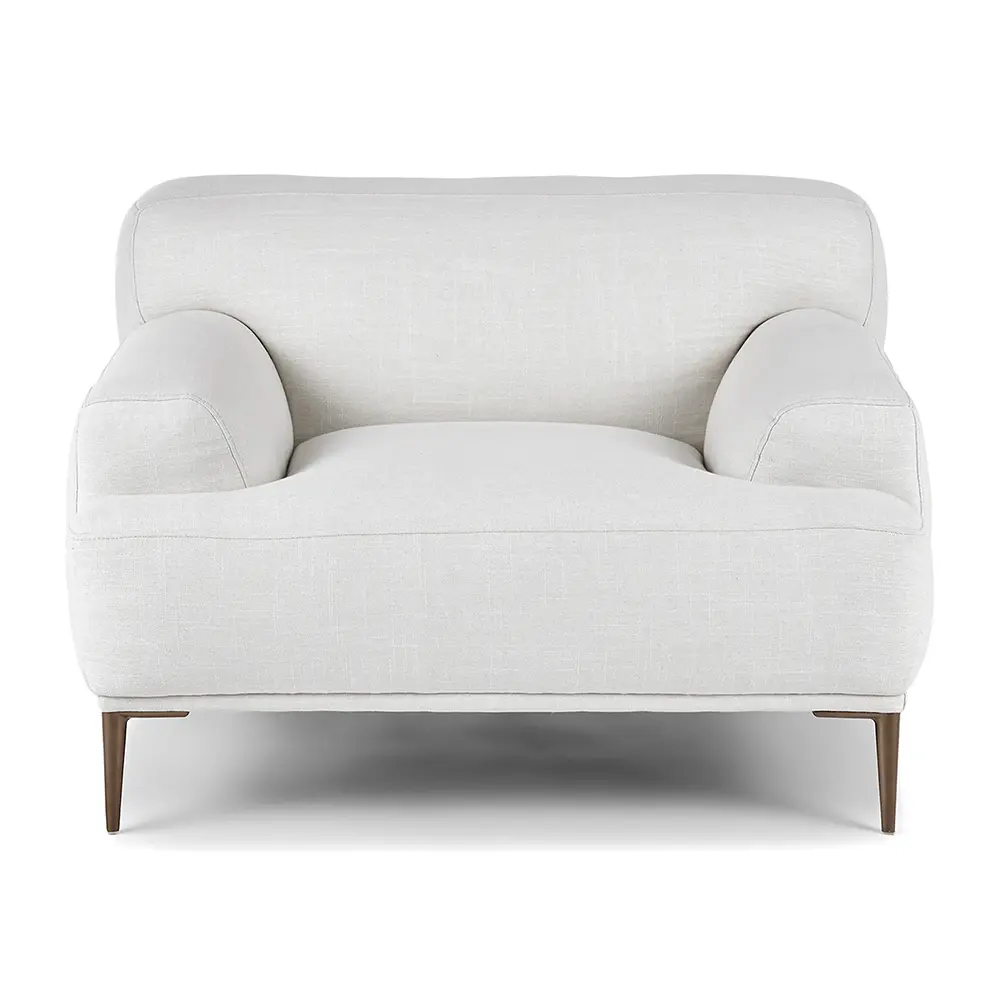 White armchair with stylish legs in a living room setting 