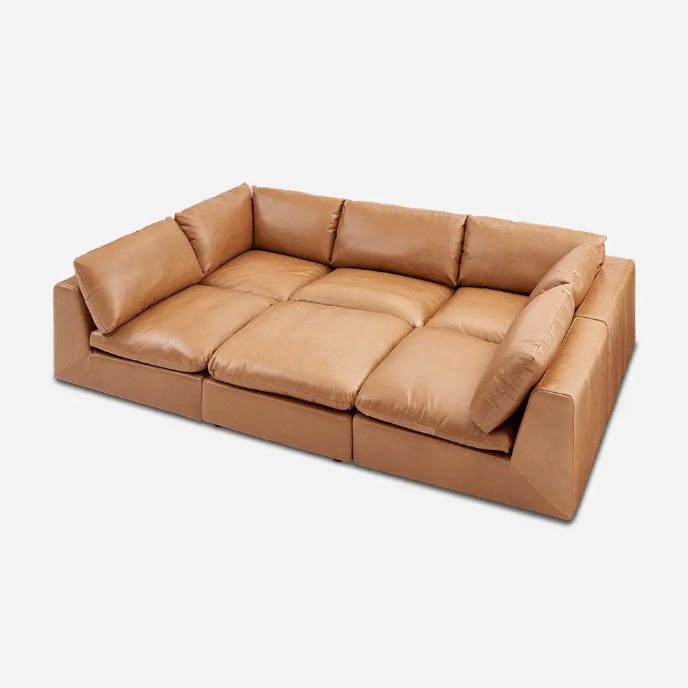 Brown leather sofa with sturdy frame in modern living room