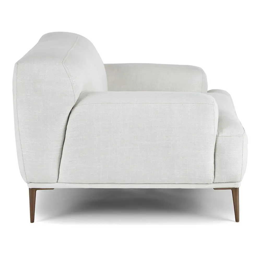 White armchair in living space.