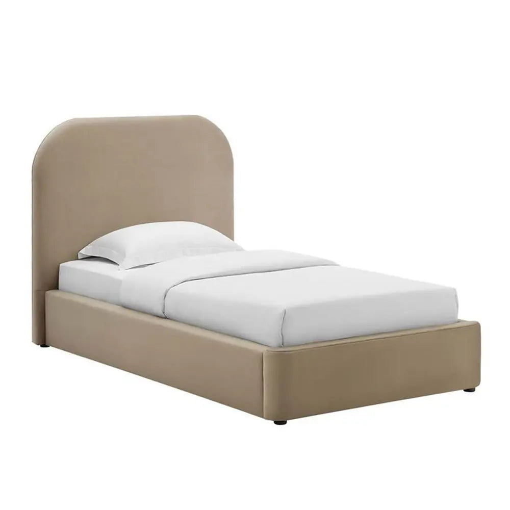 A single bed frame upholstered in beige fabric, shown with white bedding and a pillow against a plain white background.