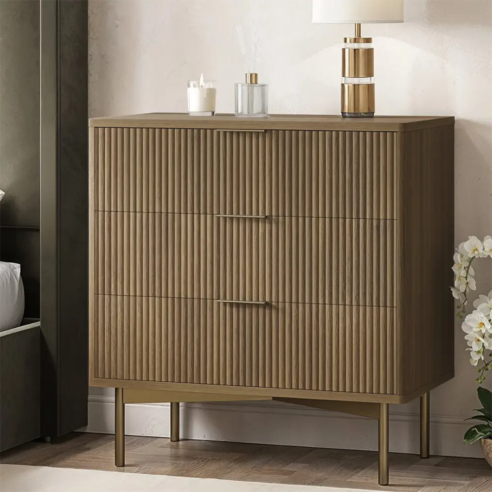Wooden dresser with decorative items in a room setting