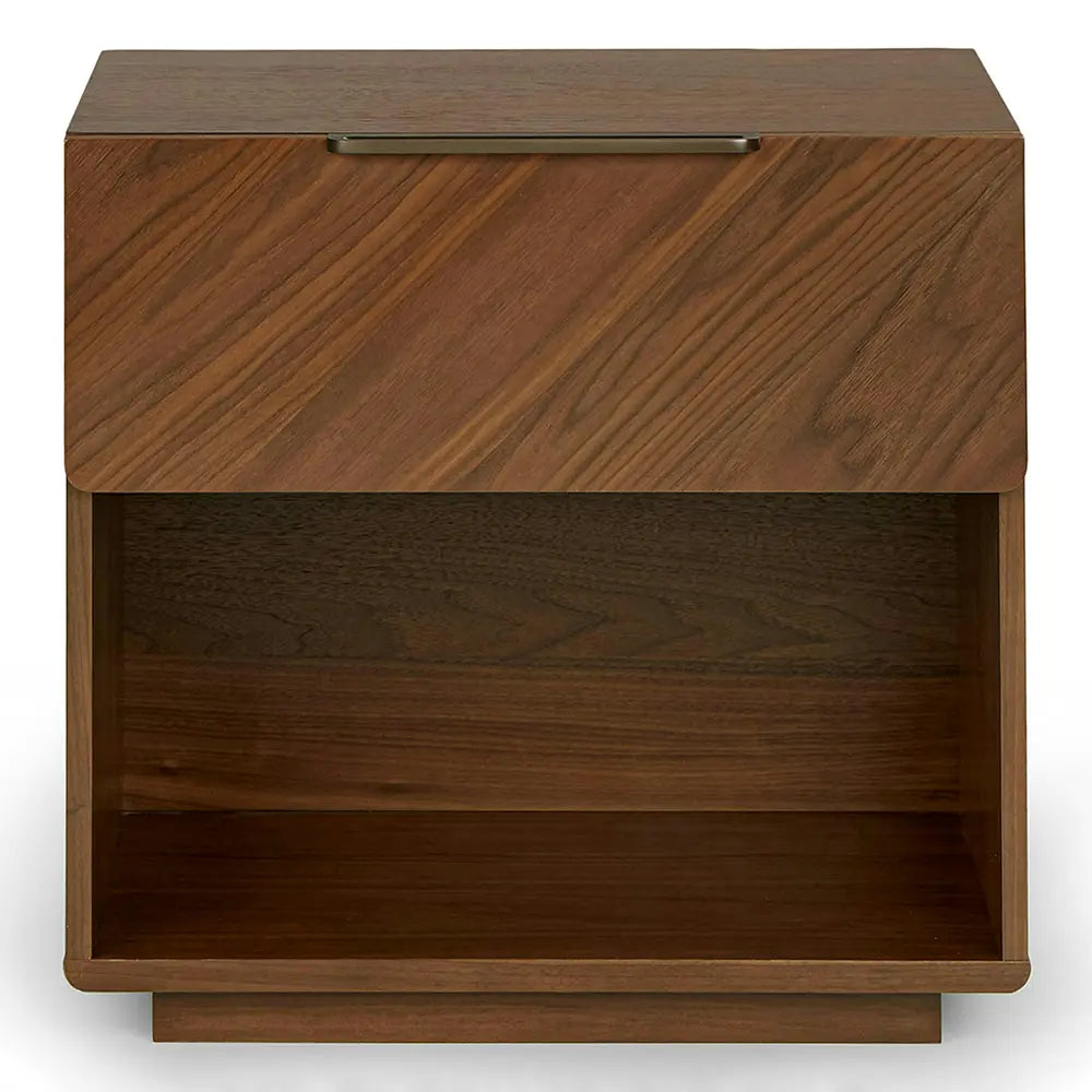 Wooden nightstand with two drawers in bedroom setting.