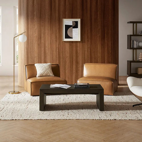 Modern living room with brown leather sectional sofa.