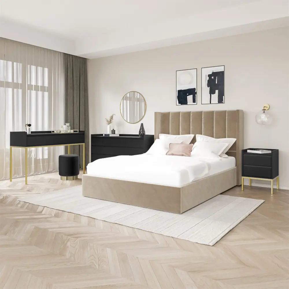 Modern bedroom with a beige upholstered bed, black nightstands, and a vanity table.