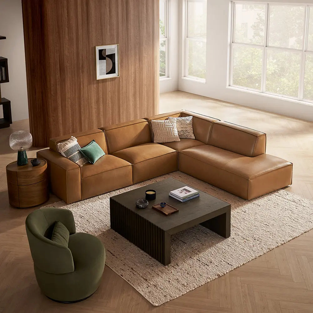 Modern living room with minimalist brown sectional sofa.