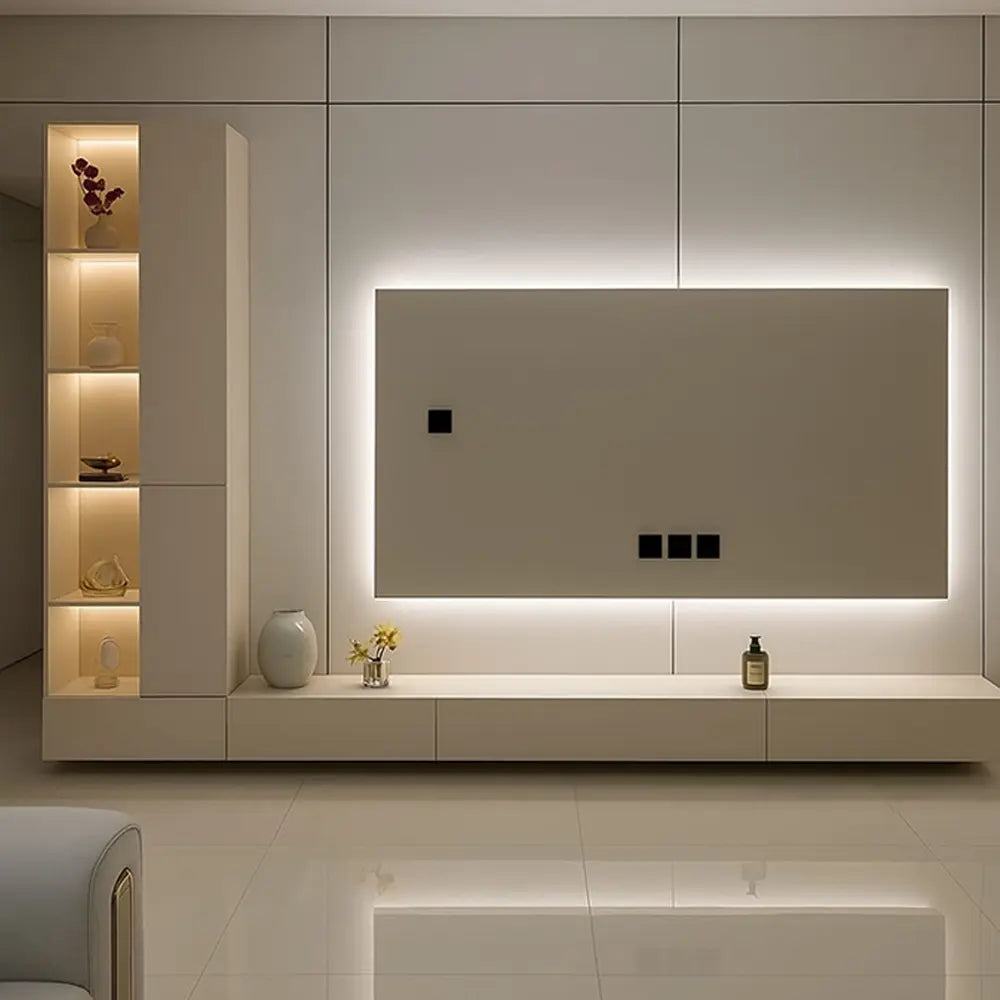 Modern living room with a TV stand on a wall, shelves, and integrated LED lighting.