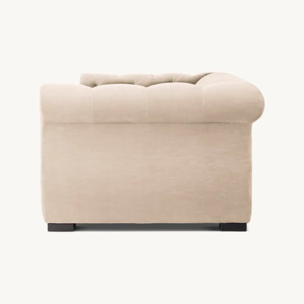 Beige sofa with premium upholstery in living room.