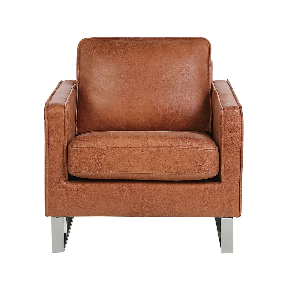 Brown leather armchair in living room.