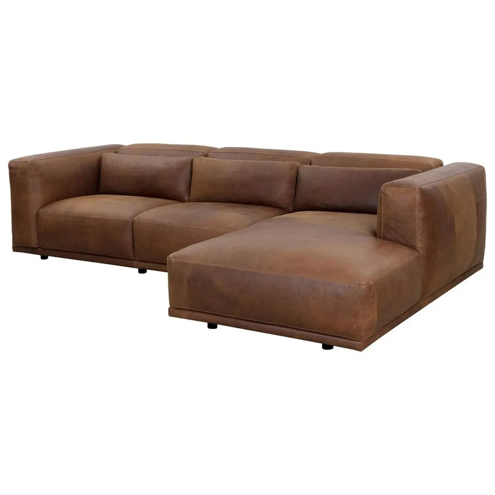 Brown leather sectional sofa with sleek finish in sitting place setting.