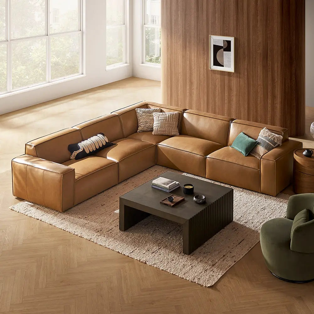 Brown sectional sofa with sturdy frame in modern living room.