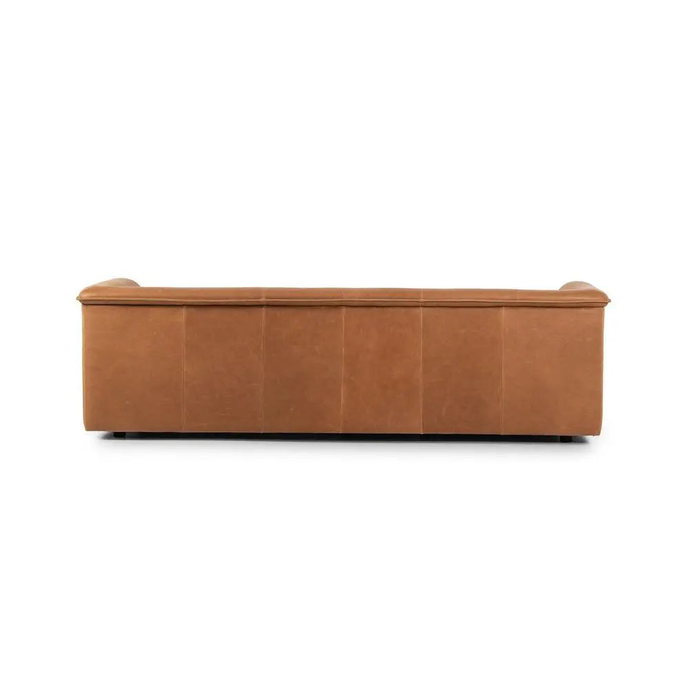 Brown leather sofa backside in modern living room