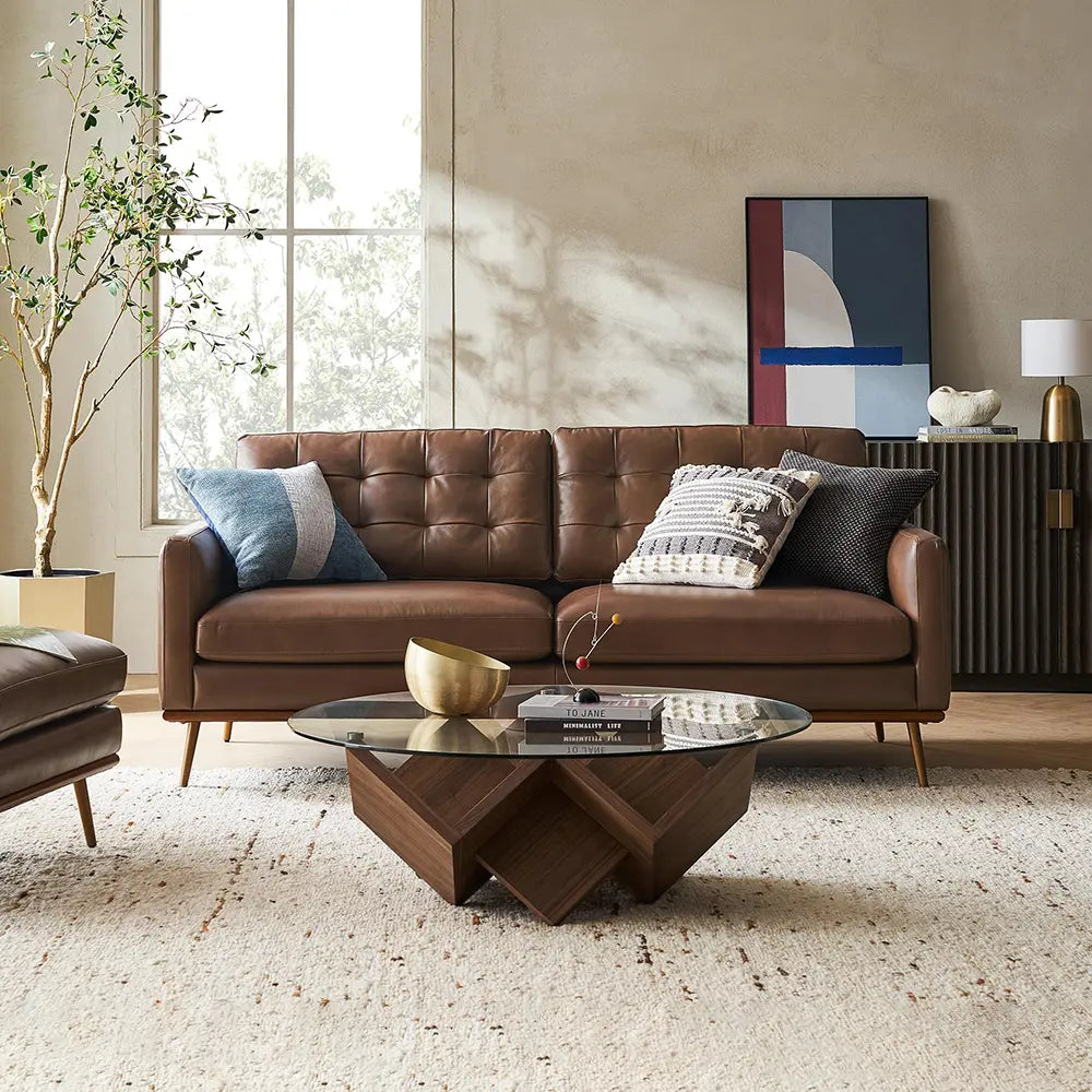 Modern living room with a brown leather sofa.