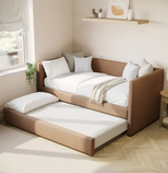 Modern bedroom with a brown bed frame and white bedding.
