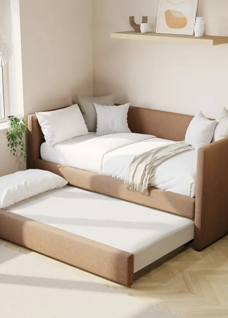 Modern bedroom with a brown bed frame and white bedding.
