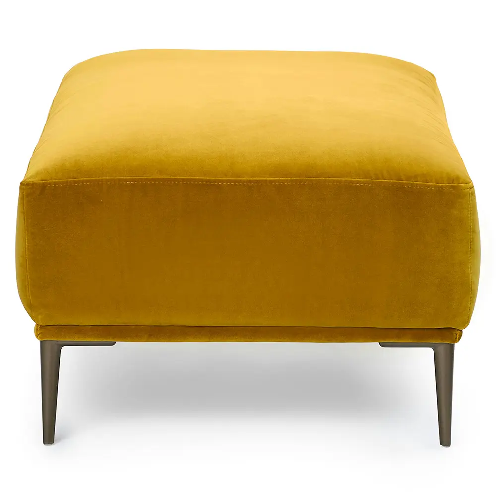 Yellow ottoman with soft, plush visual texture in living room