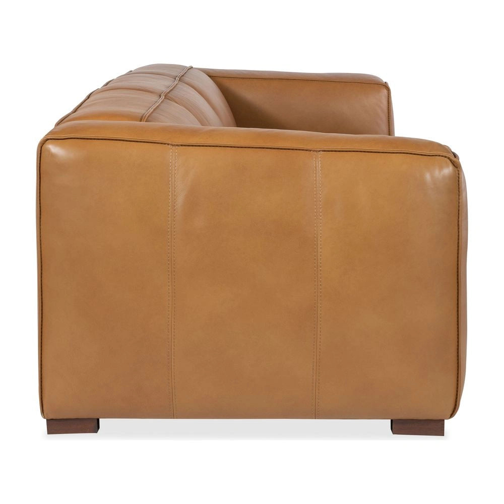 Comfy brown leather sofa on a white background