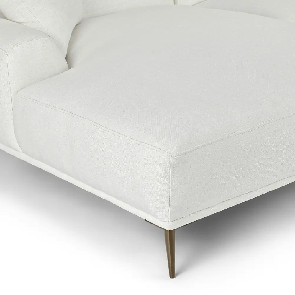 Stylish white sofa with wooden legs on a white background