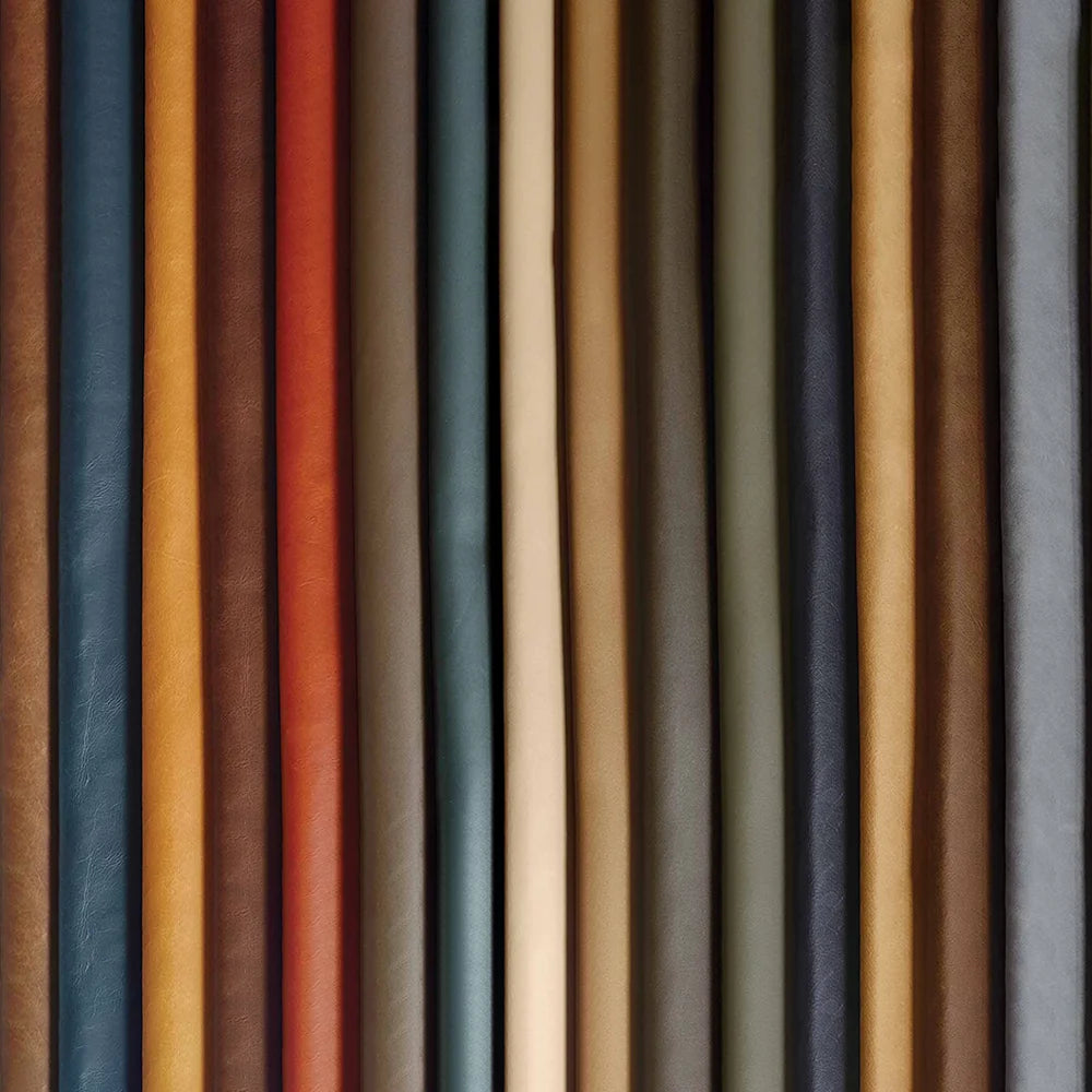 Stripes of various leather textures and colors arranged in a grid pattern.