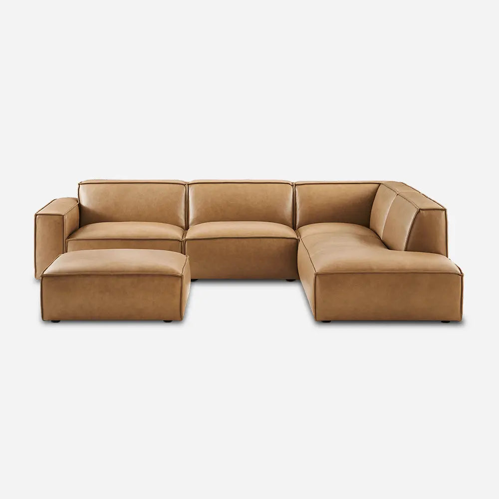 Brown leather sectional sofa with cozy design in modern living room.