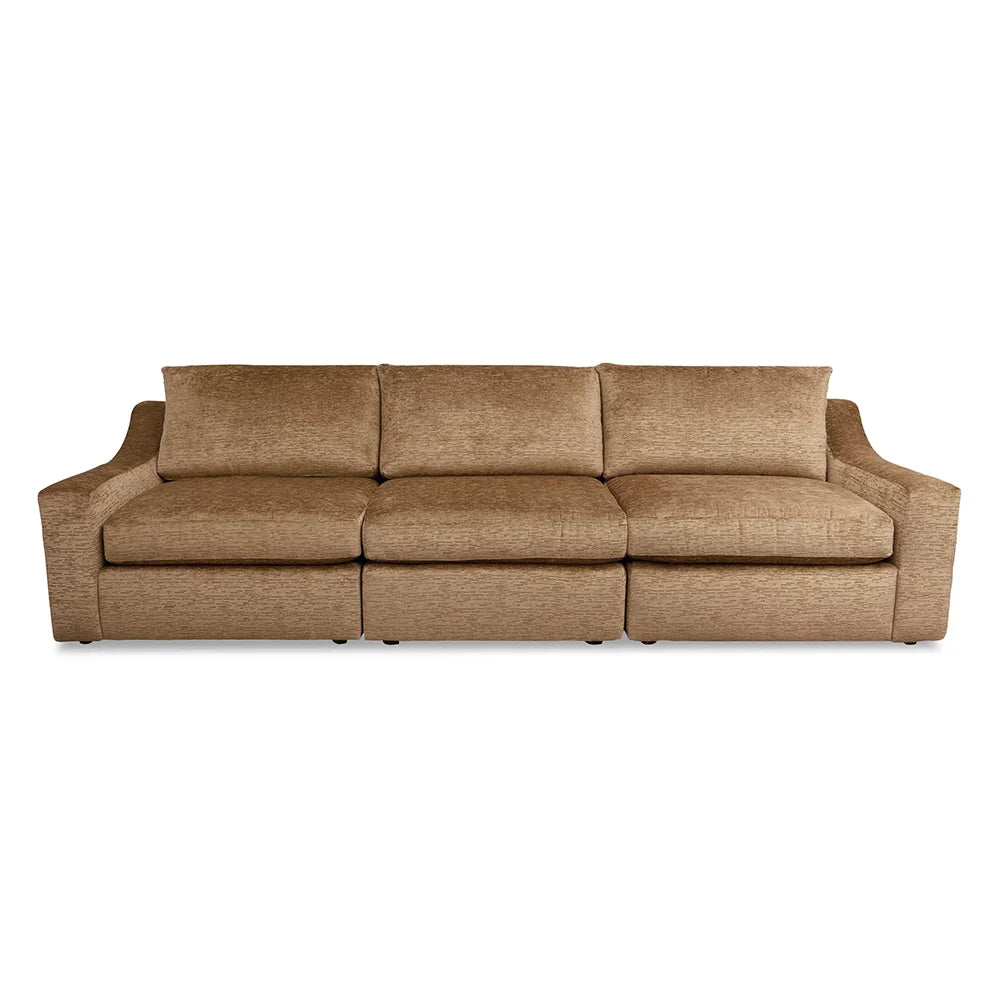 Brown sofa with premium upholstery in living room setting.