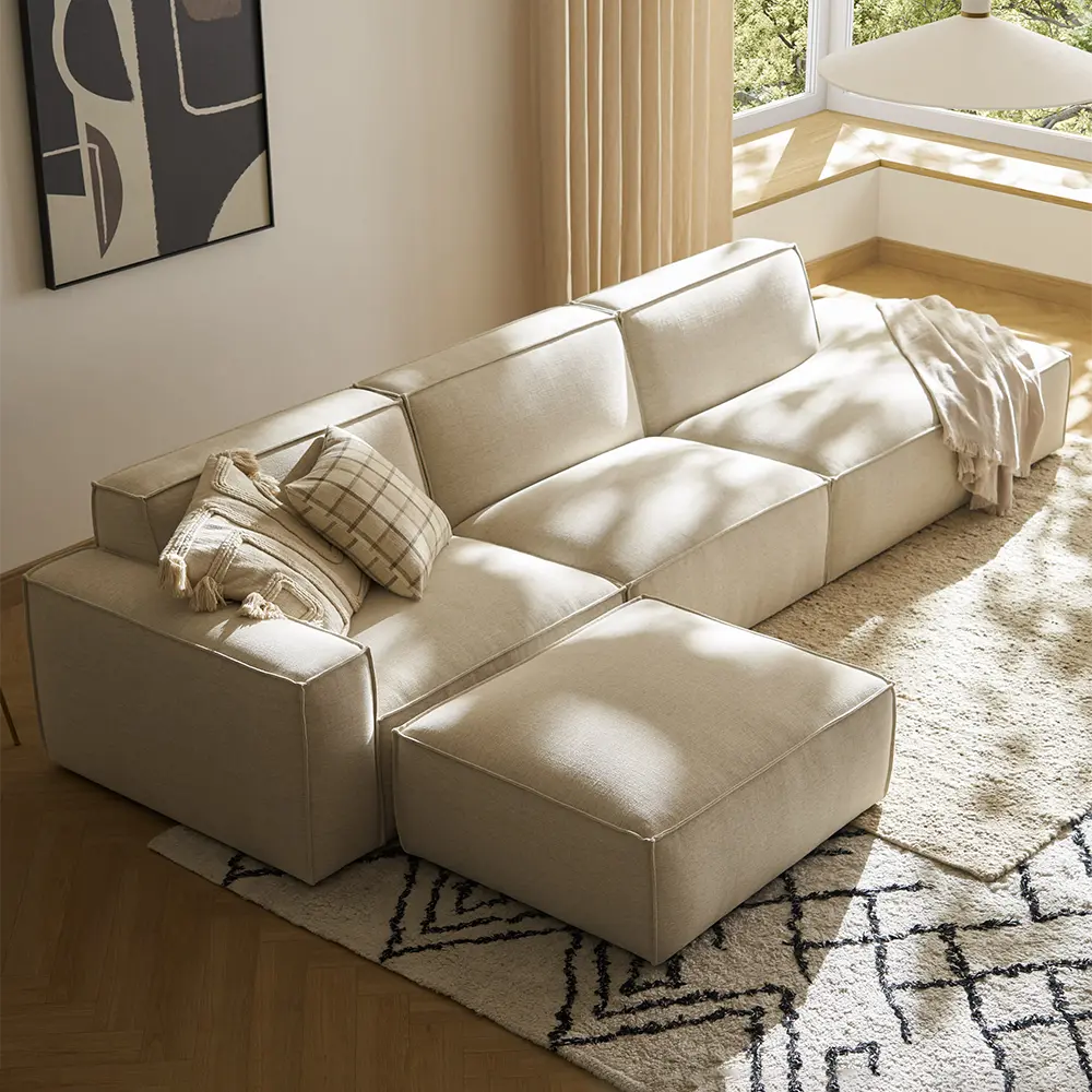 Beige sectional sofa in a living room.