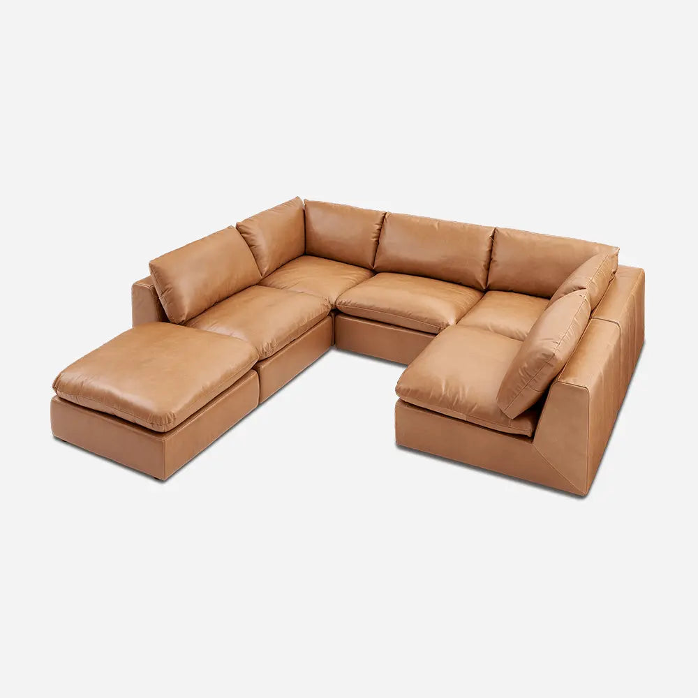 Brown leather sectional sofa in modern living room. 