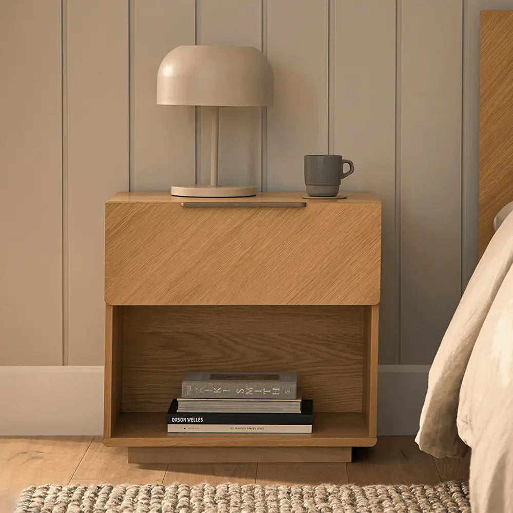 Wooden nightstand decorated in sitting space.